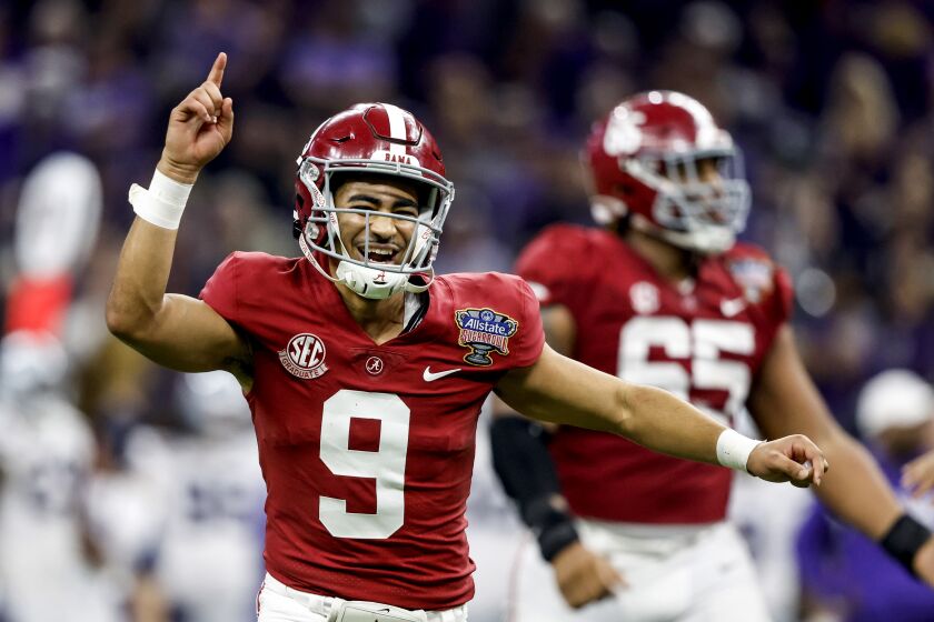 Alabama quarterback Bryce Young (9) celebrates after throwing a touchdown pass during the second half of the Sugar Bowl NCAA college football game against Kansas State, Saturday, Dec. 31, 2022, in New Orleans. (AP Photo/Butch Dill)