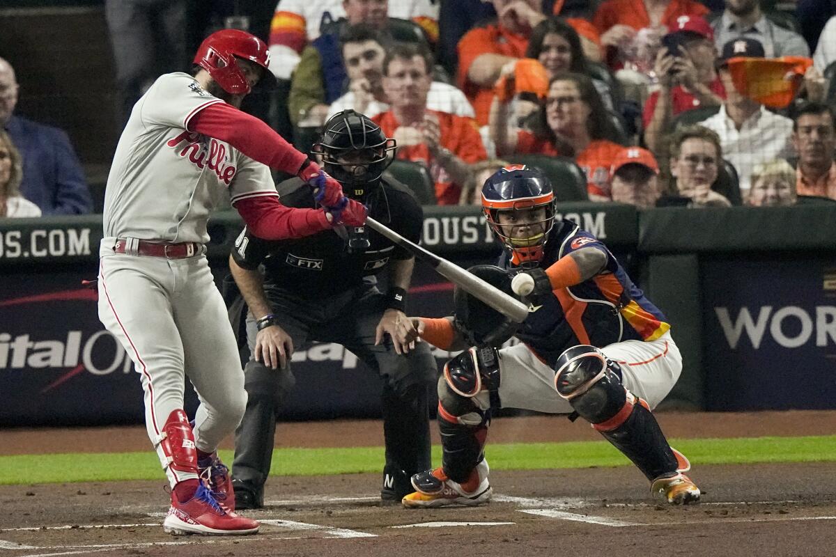 Philadelphia Phillies Bryce Harper bats during the first inning in Game 2 of the World Series against the Houston Astros.