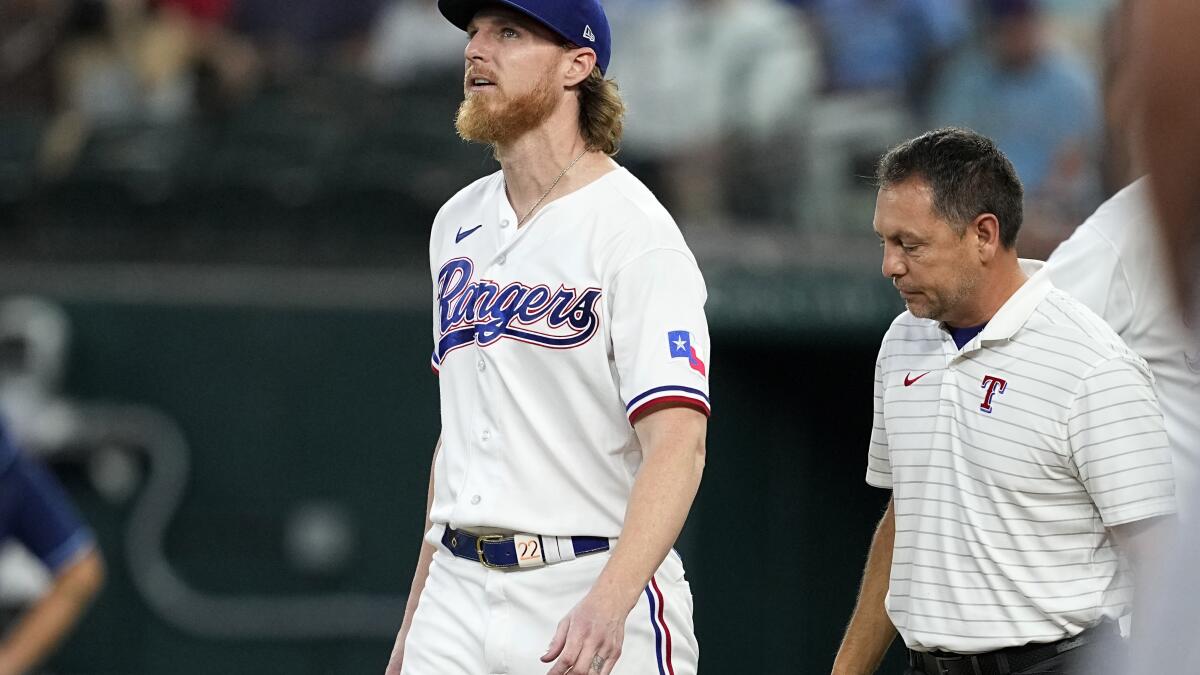 Rangers starting pitcher Gray exits in 5th inning after comebacker off left  shin