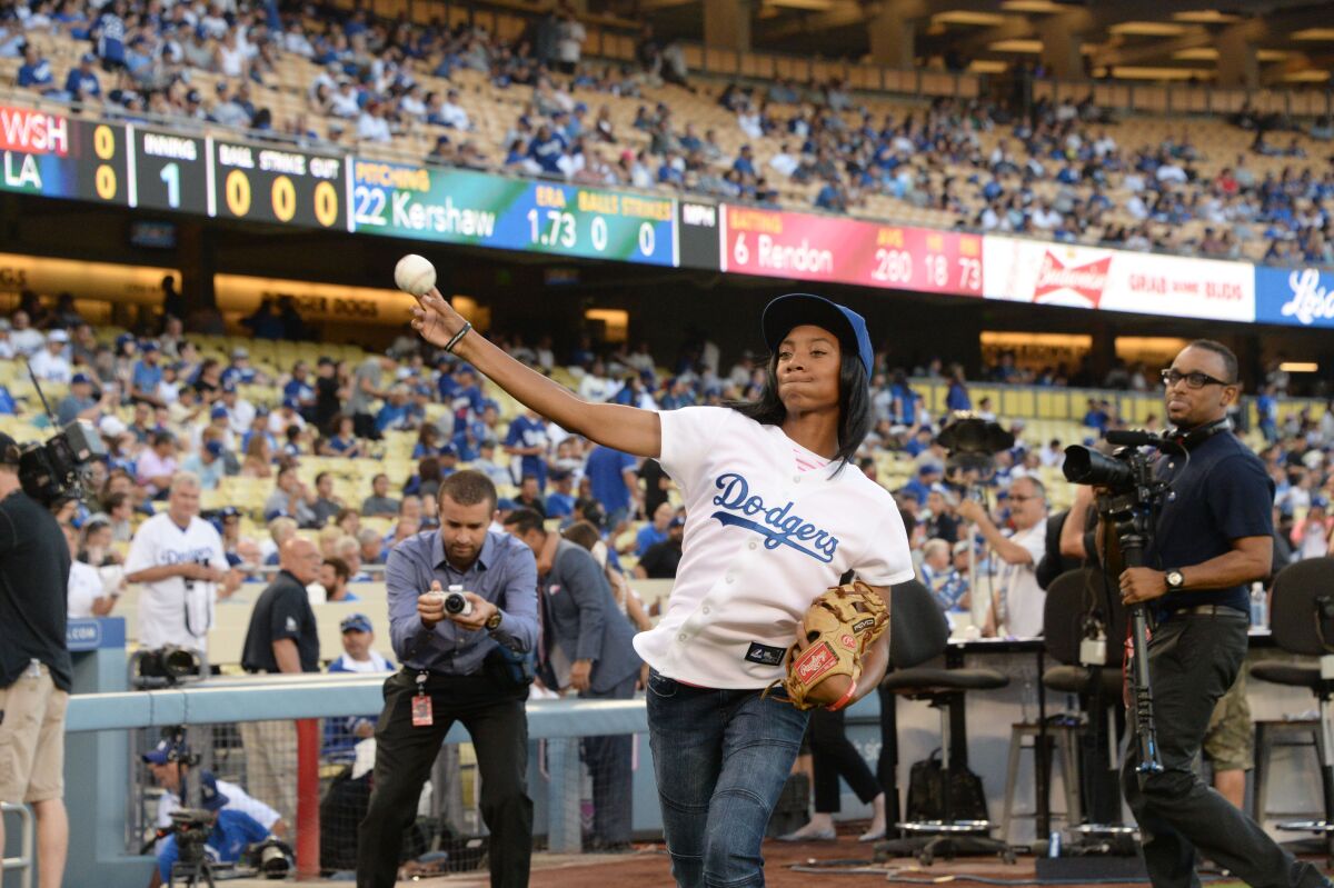 Mo'ne Davis throws out the first pitch.