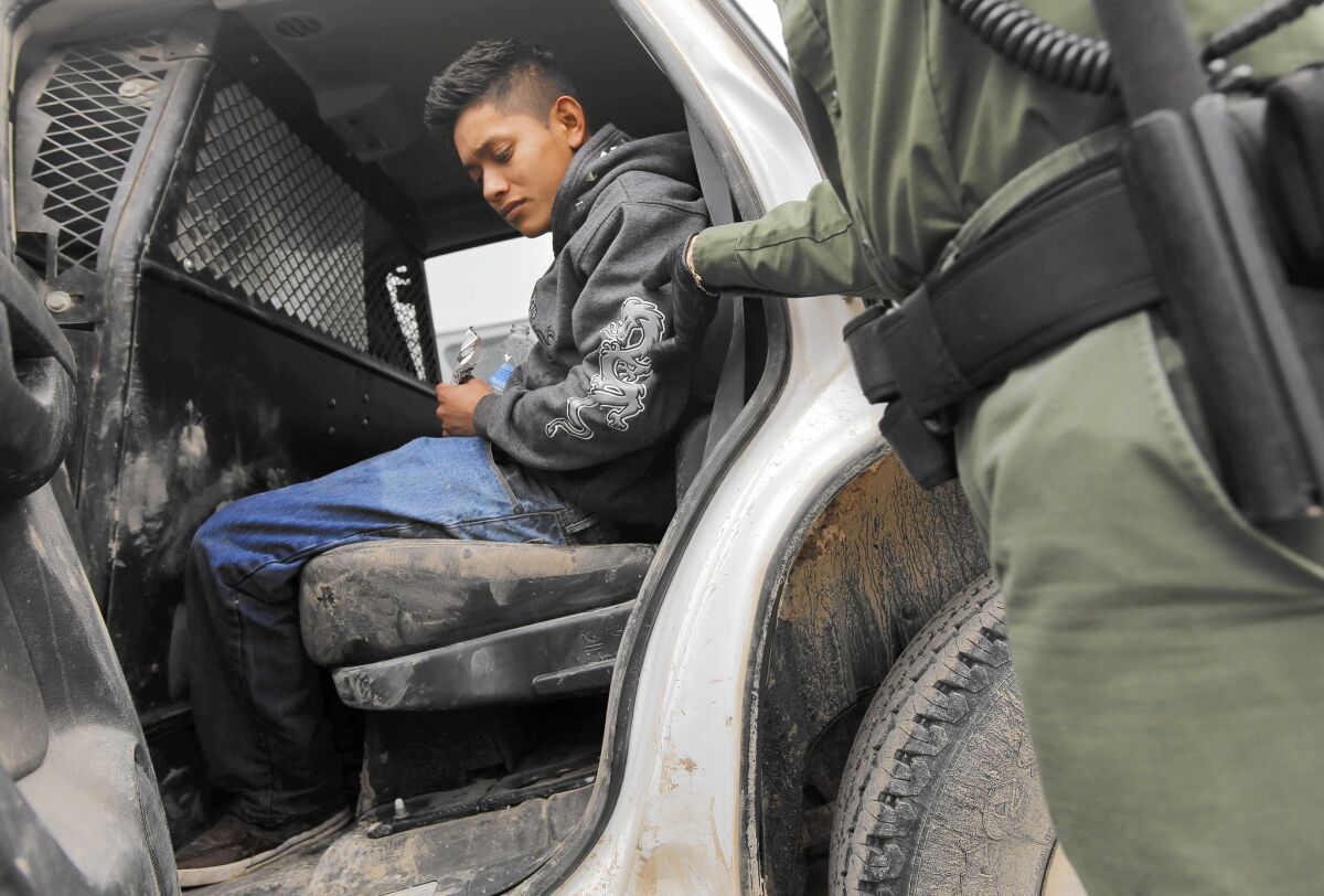 Border Patrol agents found this 17-year-old Guatemalan freezing along the Rio Grande after he fell off a raft while crossing.