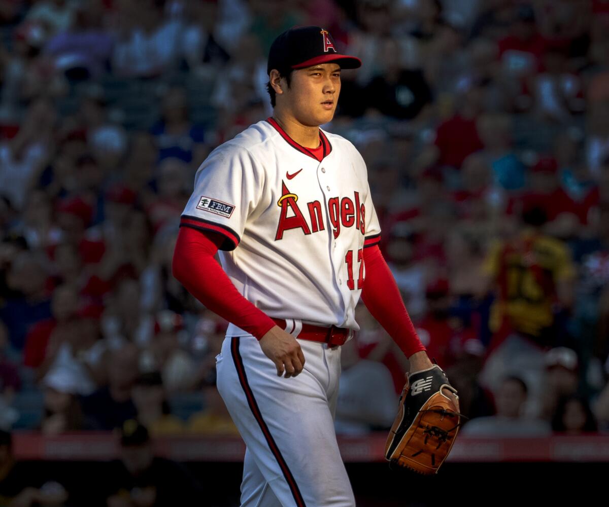 Angels pitcher Shohei Ohtani heads to the dugout in a game against the Pittsburgh Pirates on July 21.