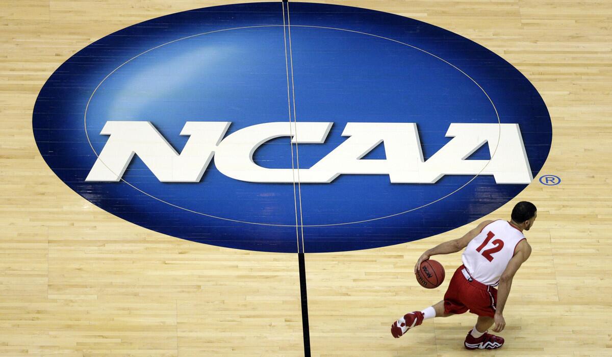 A federal judge ruled last week that NCAA policies toward college athletes violate antitrust law. Above, Wisconsin guard Traevon Jackson during the NCAA basketball tournament in Anaheim in March.