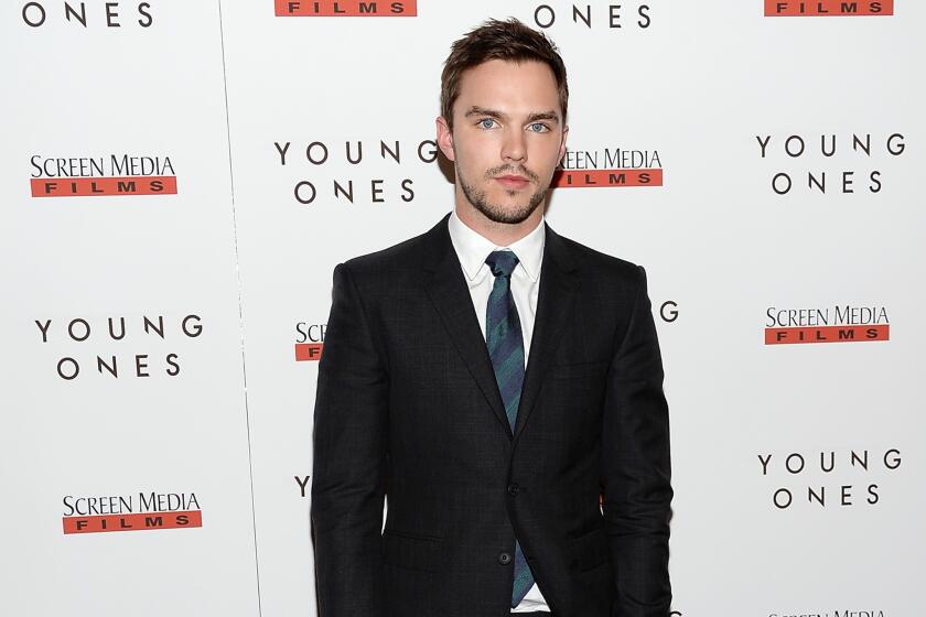 Nicholas Hoult addresses the celebrity nude photo hack that counted his ex-girlfriend Jennifer Lawrence among its victims.