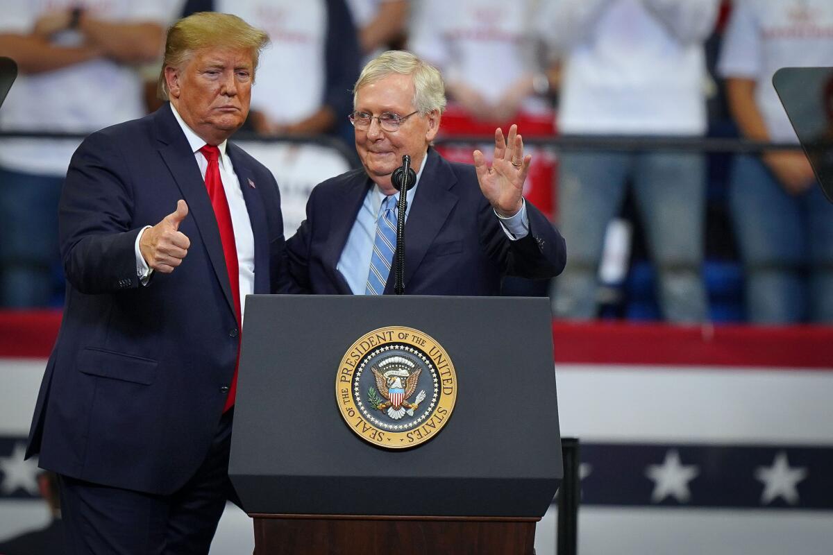President Trump with Sen. Mitch McConnell at a campaign rally for Kentucky Gov. Matt Bevin