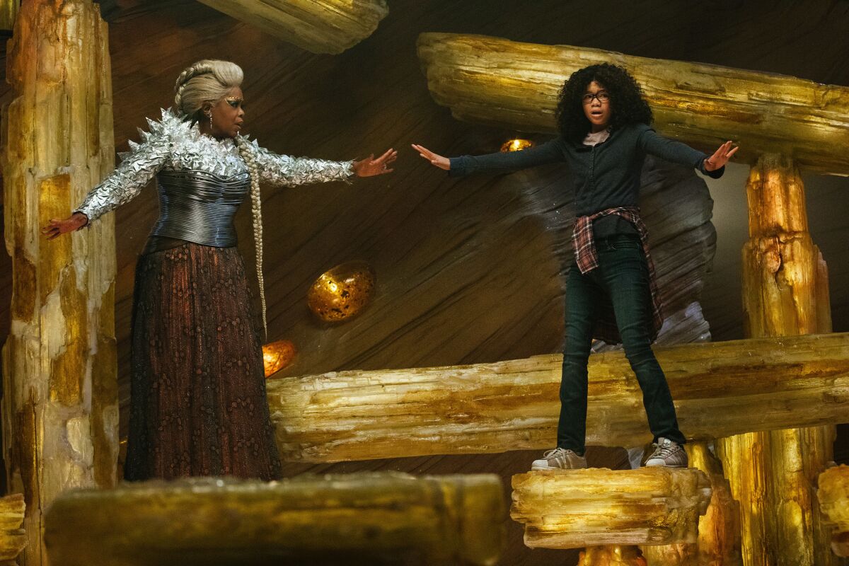 Oprah Winfrey, left, and Storm Reid in Disney's "A Wrinkle In Time," made with fewer biblical references than the original novel.