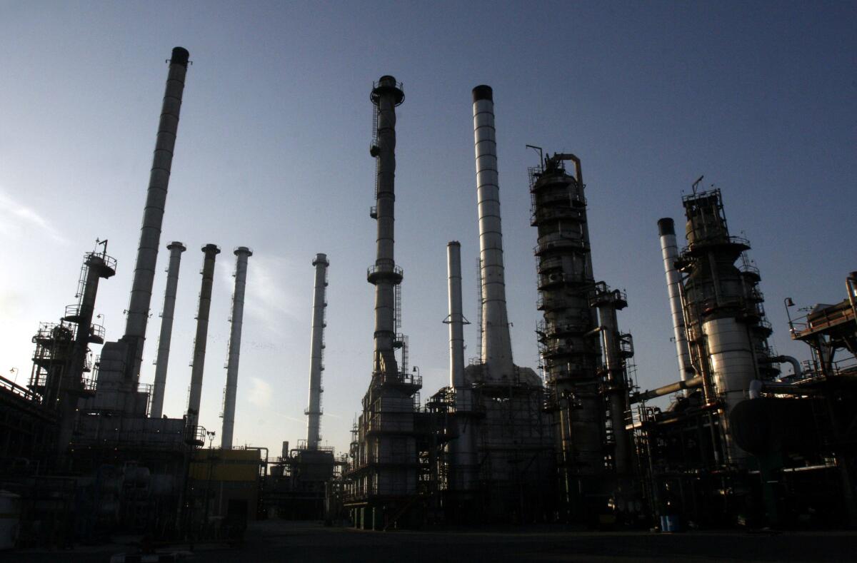 An oil refinery in Tehran in 2007. For the first time since the nuclear deal went into effect, Iran will offer an international tender for oil and gas projects.