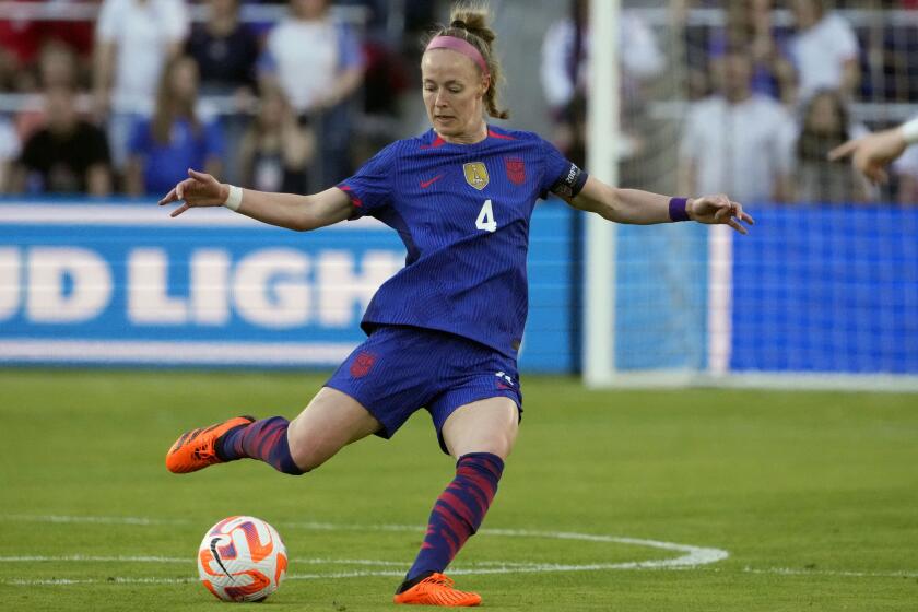 FILE - United States' Becky Sauerbrunn handles the ball during the first half of an international friendly soccer match against Ireland, April 11, 2023, in St. Louis. U.S. national team captain Sauerbrunn has a right foot injury that will keep her out of the Women's World Cup next month. A person familiar with the matter confirmed that Sauerbrunn will miss the World Cup, first reported by The Athletic. The person spoke on the condition of anonymity because an Sauerbrunn's status has not been publicly announced. (AP Photo/Jeff Roberson, File)