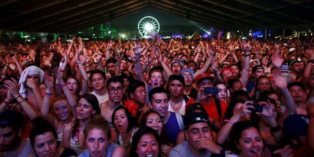 Fans wait for Frank Ocean to perform in the Gobi tent, on the first day of week two of the Coachella Valley Music and Arts Festival 2012.