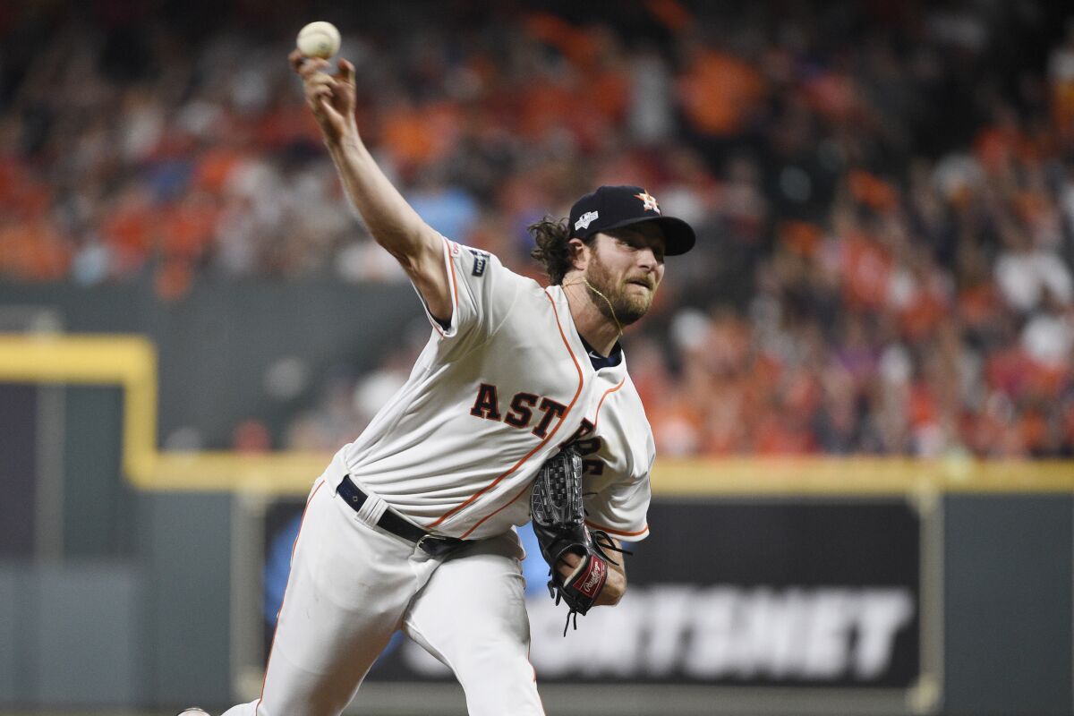 Astros pitcher Gerrit Cole delivers against the Rays in Game 2 the ALDS in Houston on Saturday.