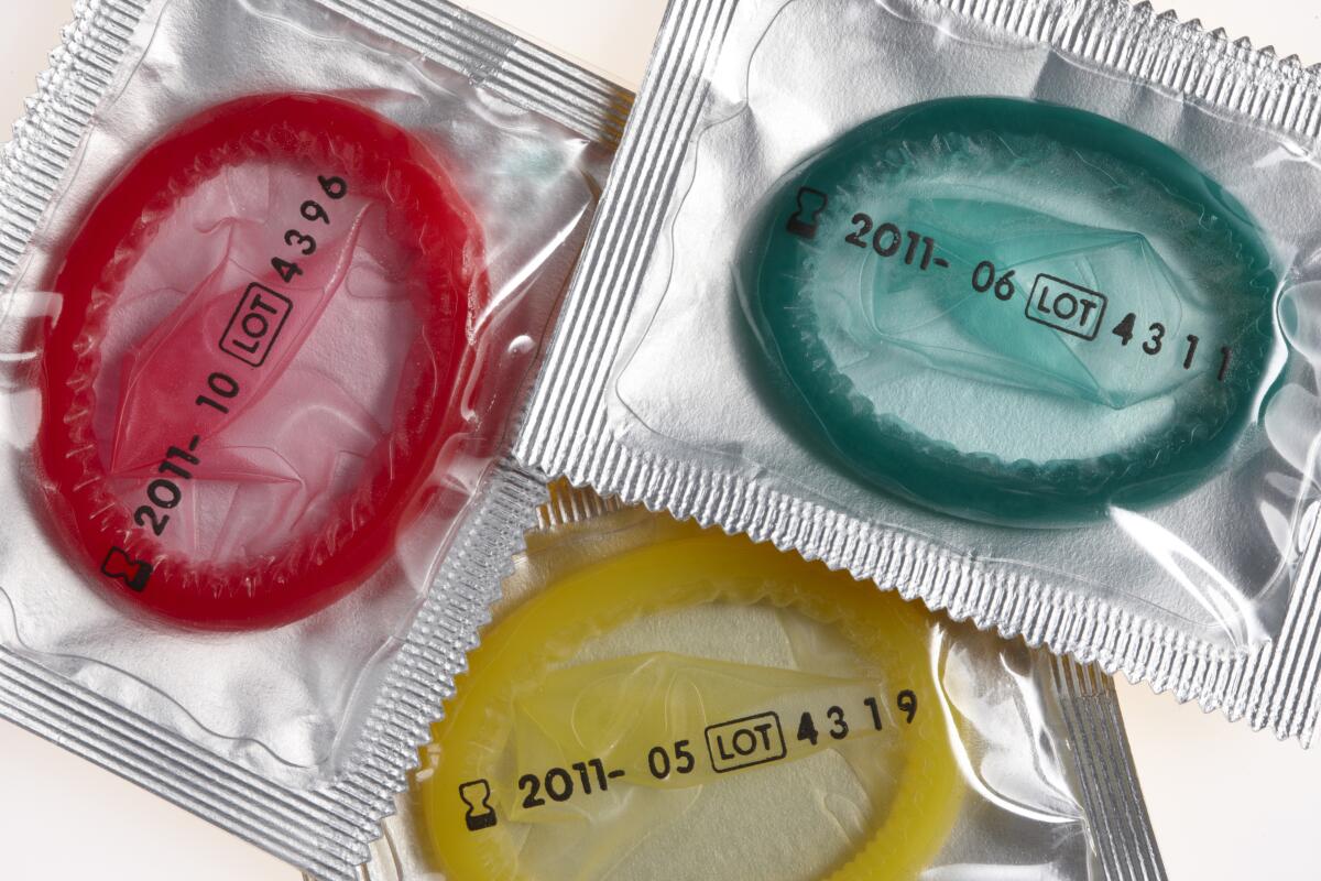 Multicolored condoms in plastic 