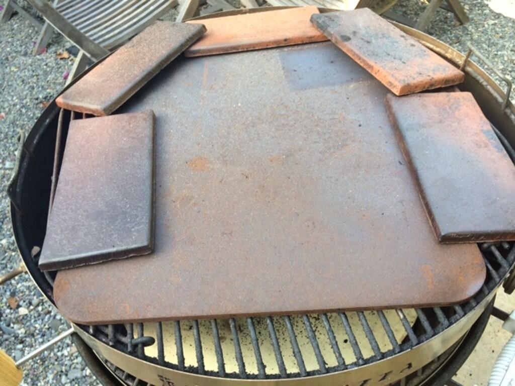 Place a second grill on top and arrange a cover of steel, quarry tile or whatever you have.