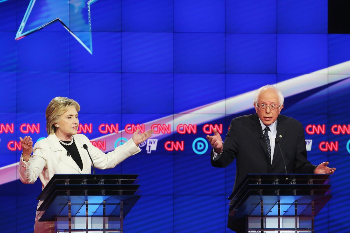 Democratic presidential candidates Hillary Clinton and Bernie Sanders at the CNN debate April 14 in New York.