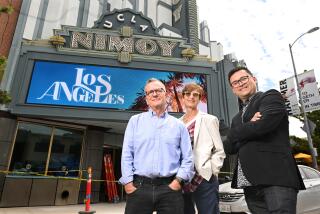 Los Angeles, California August 10, 2023-From left, Fred Frumberg, Meryl Friedman and Edgar Miramontes stand in front of the Nimoy Theatre formerly the historic Crest Theatre. (Wally Skalij/Los Angles Times)