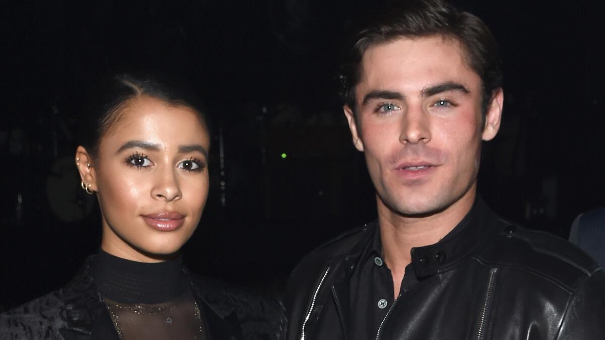 Sami Miro and Zac Efron, seen at a St. Laurent event in February in L.A., have reportedly split.