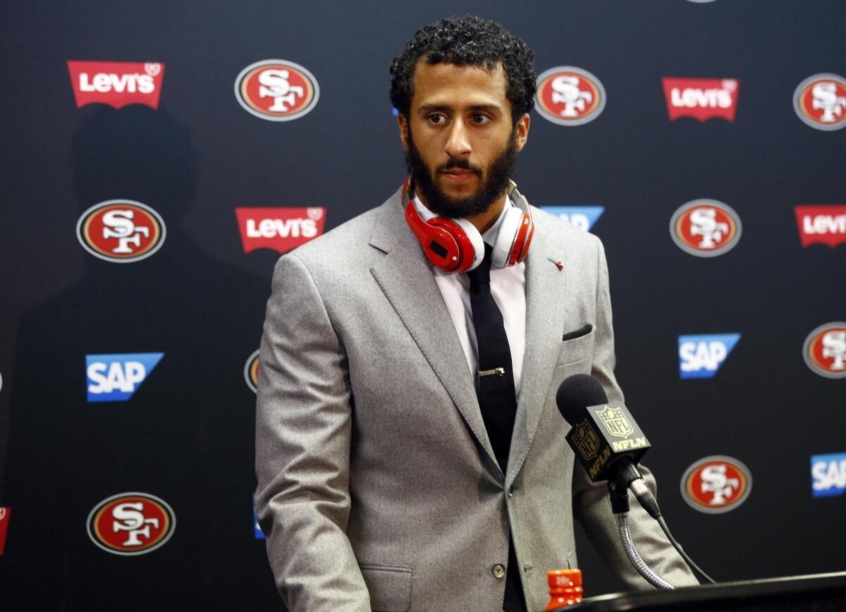 San Francisco quarterback Colin Kaepernick speaks during a news conference after a Nov. 1 game against the Rams in St. Louis.