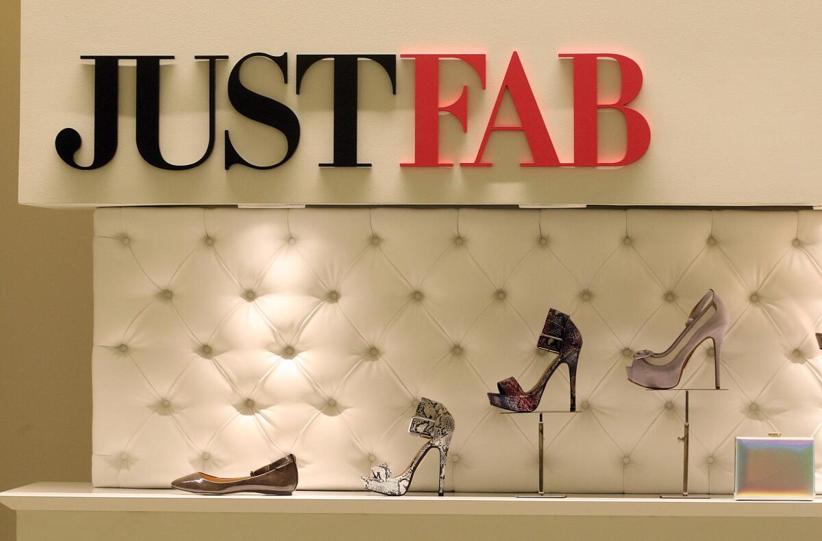 Shoes are displayed at JustFab's store in the Glendale Galleria on May 30. The El Segundo company was among those that announced new investments in the third quarter of 2014.