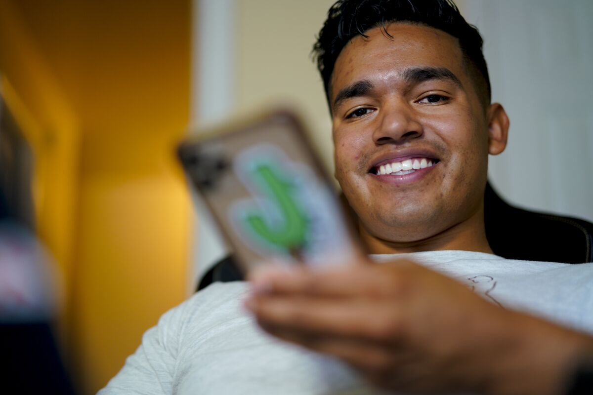 Jesus Morales, known as Juixxe on TikTok, uses public donations to donate cash to Southern California street vendors.