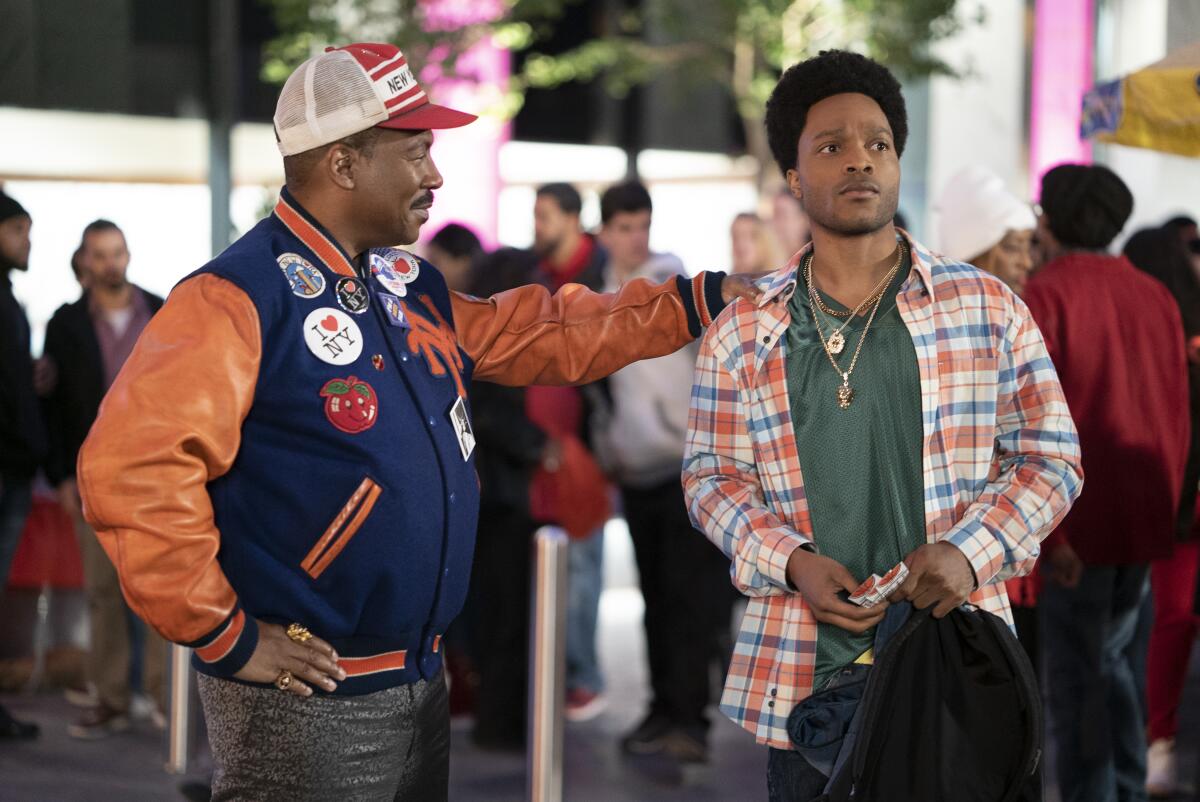 Eddie Murphy, left, and Jermaine Fowler appear in a scene from "Coming 2 America." (Quantrell D. Colbert/Paramount Pictures via AP)