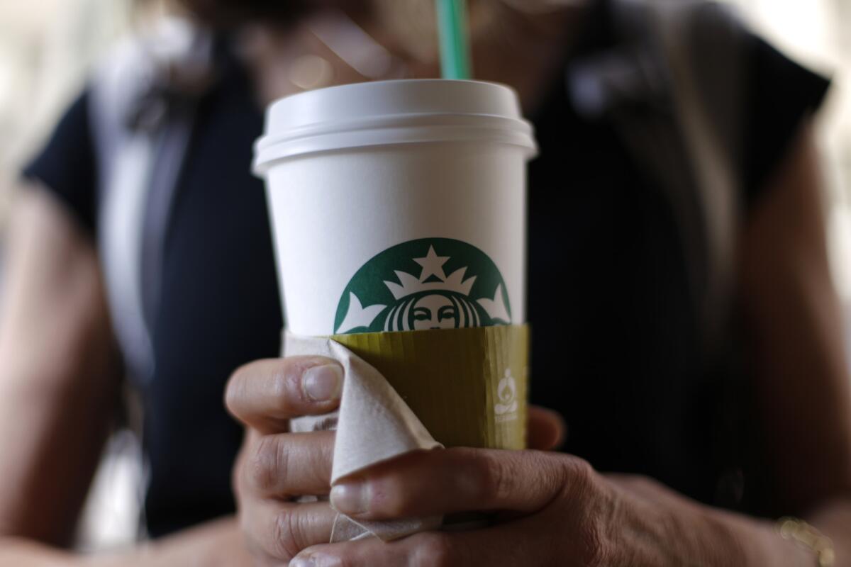 Starbucks said it will start delivery services in select markets next year.