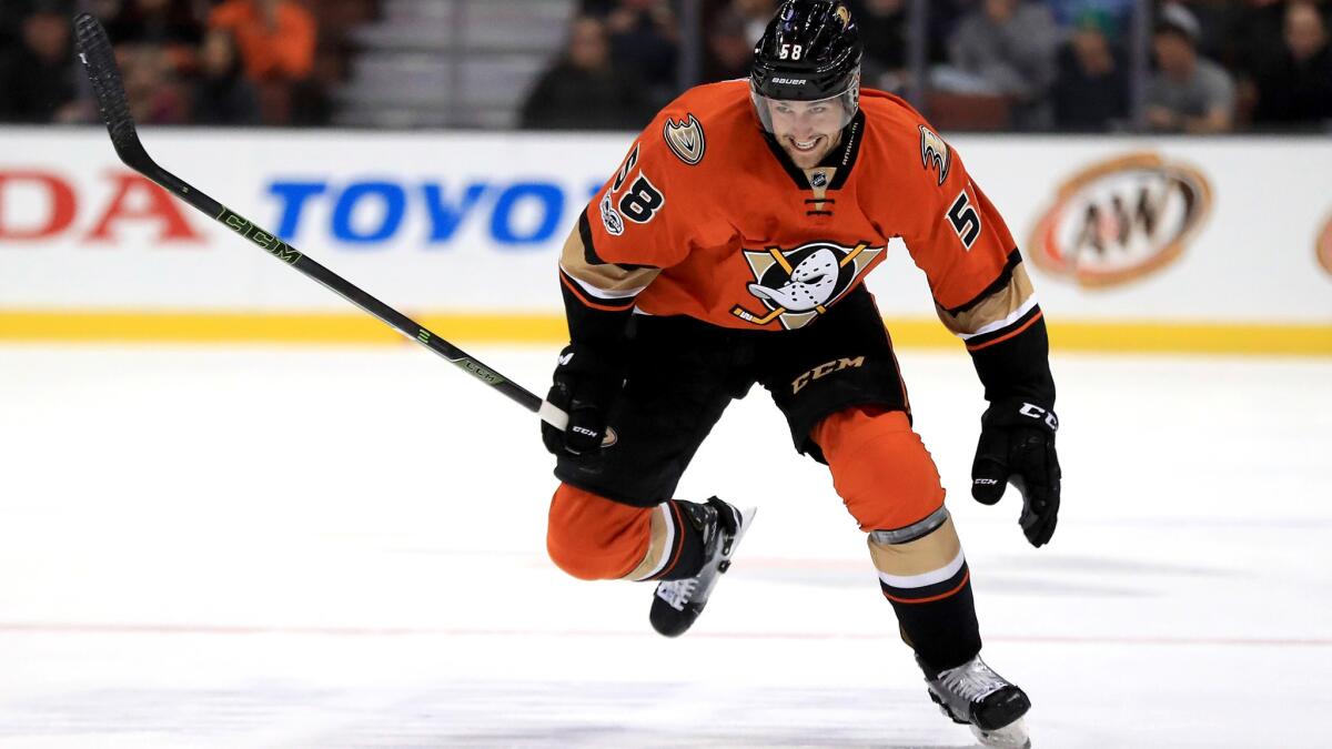 Nic Kerdiles skates up ice during his debut for the Ducks.