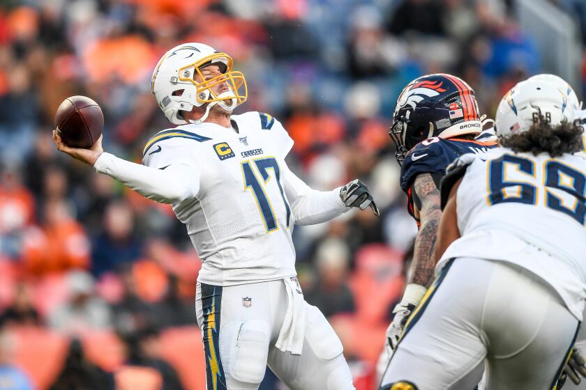 DENVER, CO - DECEMBER 1: Philip Rivers #17 of the Los Angeles Chargers passes against the Denver Broncos in the second quarter of a game at Empower Field at Mile High on December 1, 2019 in Denver, Colorado. (Photo by Dustin Bradford/Getty Images)
