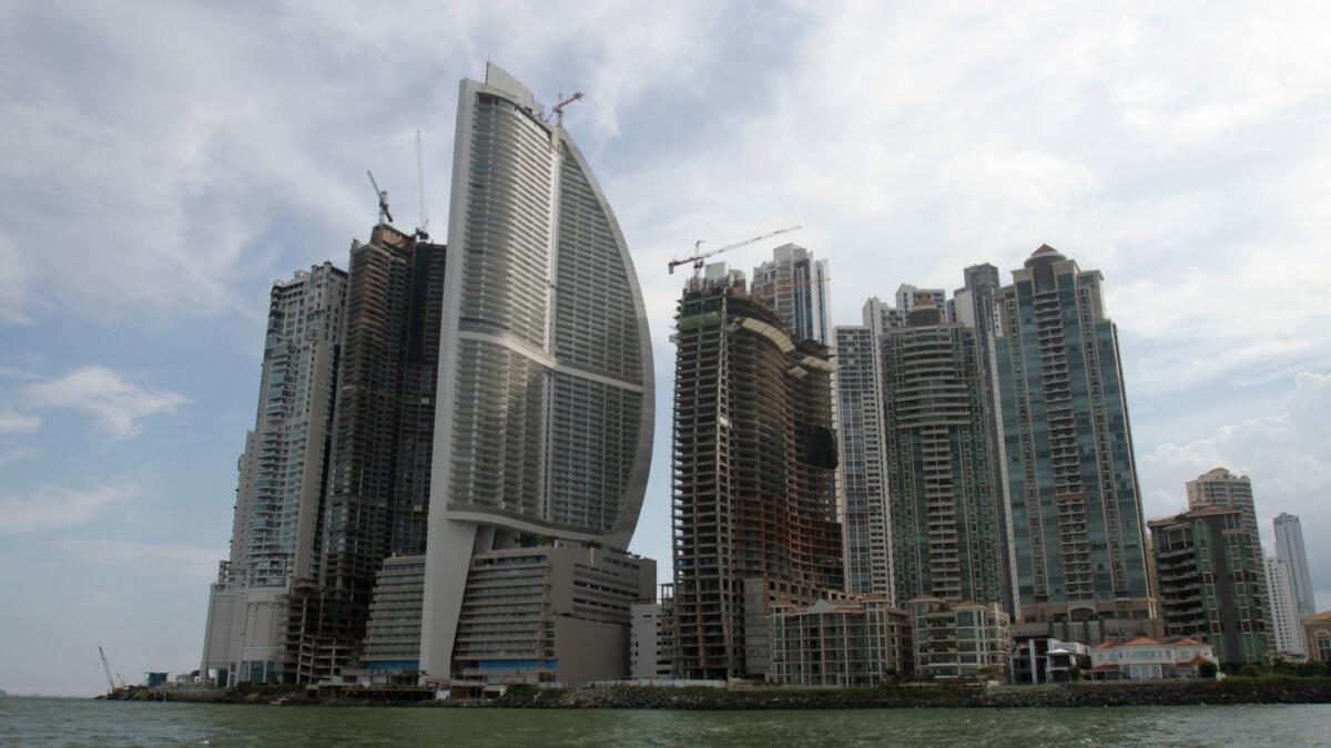 The Trump International Hotel Panama is the third building from left. Panama's government is investigating a complaint that executives of President Trump's family hotel business are refusing to leave the 70-story luxury Trump hotel amid a management dispute.