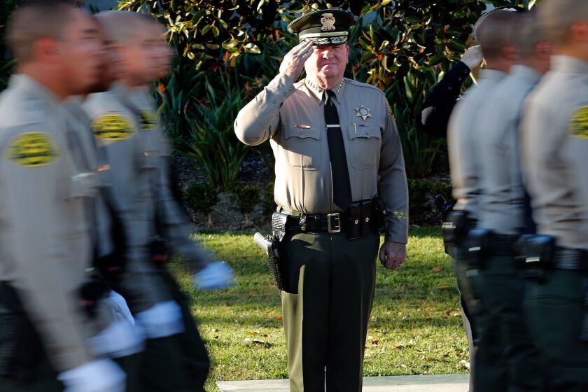 LOS ANGELES, CA-OCTOBER 27, 2017: Los Angeles County Sheriff Jim McDonnell salutes new deputies as they march past him during a graduation ceremony at the Biscailuz Training Center of the Los Angeles County Sheriff's Dept. in East Los Angeles on October 27, 2017. (Mel Melcon/Los Angeles Times)*** FOR SPECIAL PROJECT DO NOT USE ***