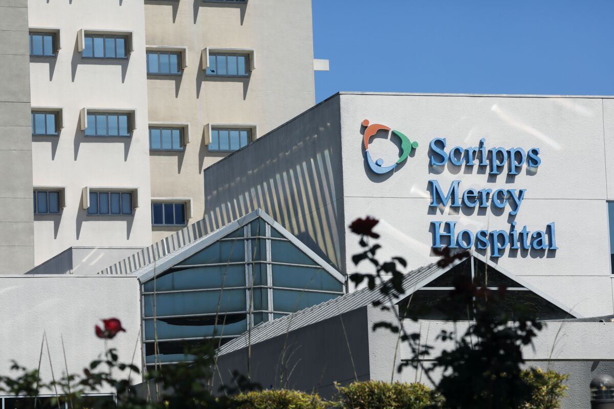 The exterior of a building with signage that read "Scripps Memorial Hospital"