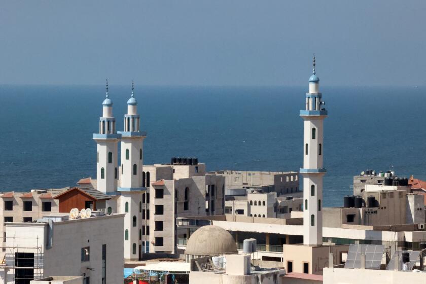A picture shows Gaza City and its Mediterranean Sea coastline, on July 27, 2021. - Human Rights Watch said today that both Israel and Gaza's Islamist rulers Hamas probably committed war crimes during their latest war in May. The 11-day conflict saw Hamas and other Palestinian armed groups in Gaza fire thousands of rockets at Israel, which retaliated with hundreds of deadly air strikes. (Photo by SAID KHATIB / AFP) (Photo by SAID KHATIB/AFP via Getty Images)