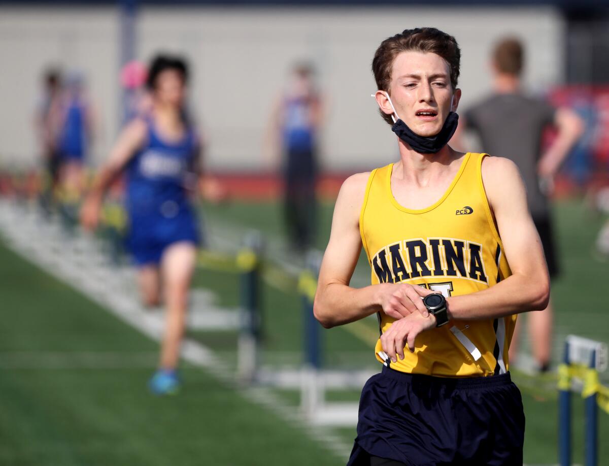 Marina cross-country runner Vincent Beaumont runs a strong race, finishing second for his school and fifth overall Saturday.