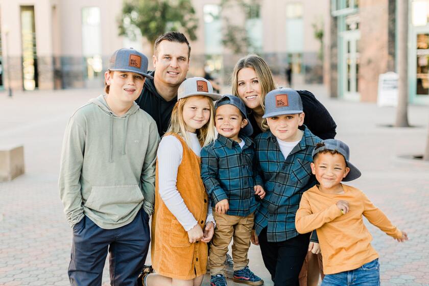 The Knutsen family of Huntington Beach includes, left to right, Brady, father Rob, Sadie, Bentley, mother Holly, Brock and AJ.