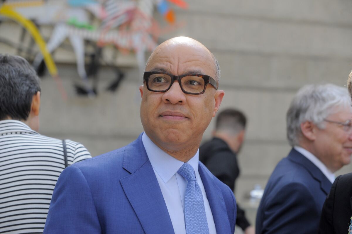 FILE - Ford Foundation President Darren Walker attends a reception at the Charles H. Wright Museum in Detroit, on Tuesday, June 16, 2015. Ford Foundation, one of the largest private foundations in the United States, announced Monday, Oct. 18, 2021 that it will divest millions from fossil fuels, following similar investment decisions made by other sizable foundations in recent years. (Steve Perez/Detroit News via AP)