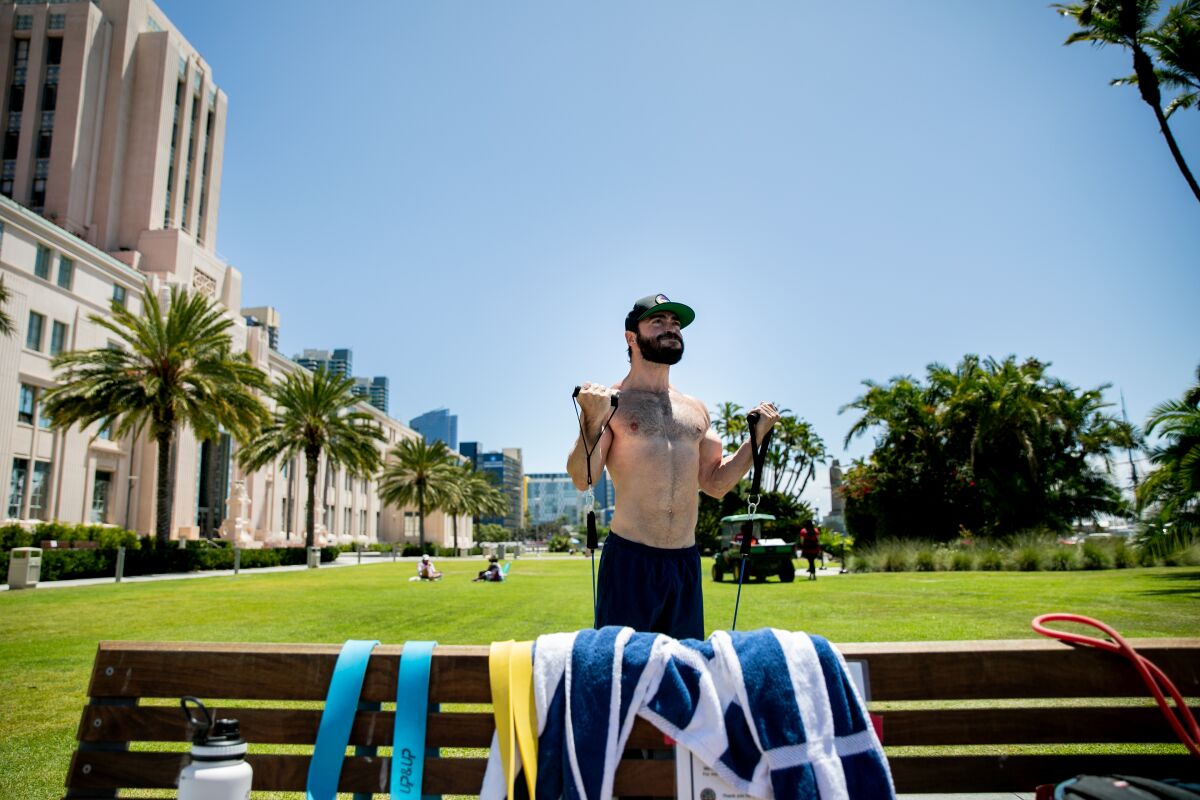 Jayson Chabrow works out at San Diego County's Waterfront Park on Wednesday.