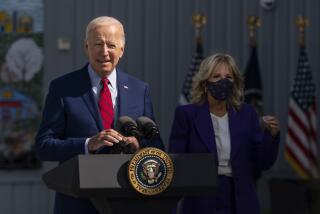President Joe Biden, with first lady Jill Biden, speaks during a visit at Brookland Middle School in northeast Washington, Friday, Sept. 10, 2021. Biden has encouraged every school district to promote vaccines, including with on-site clinics, to protect students as they return to school amid a resurgence of the coronavirus. (AP Photo/Manuel Balce Ceneta)