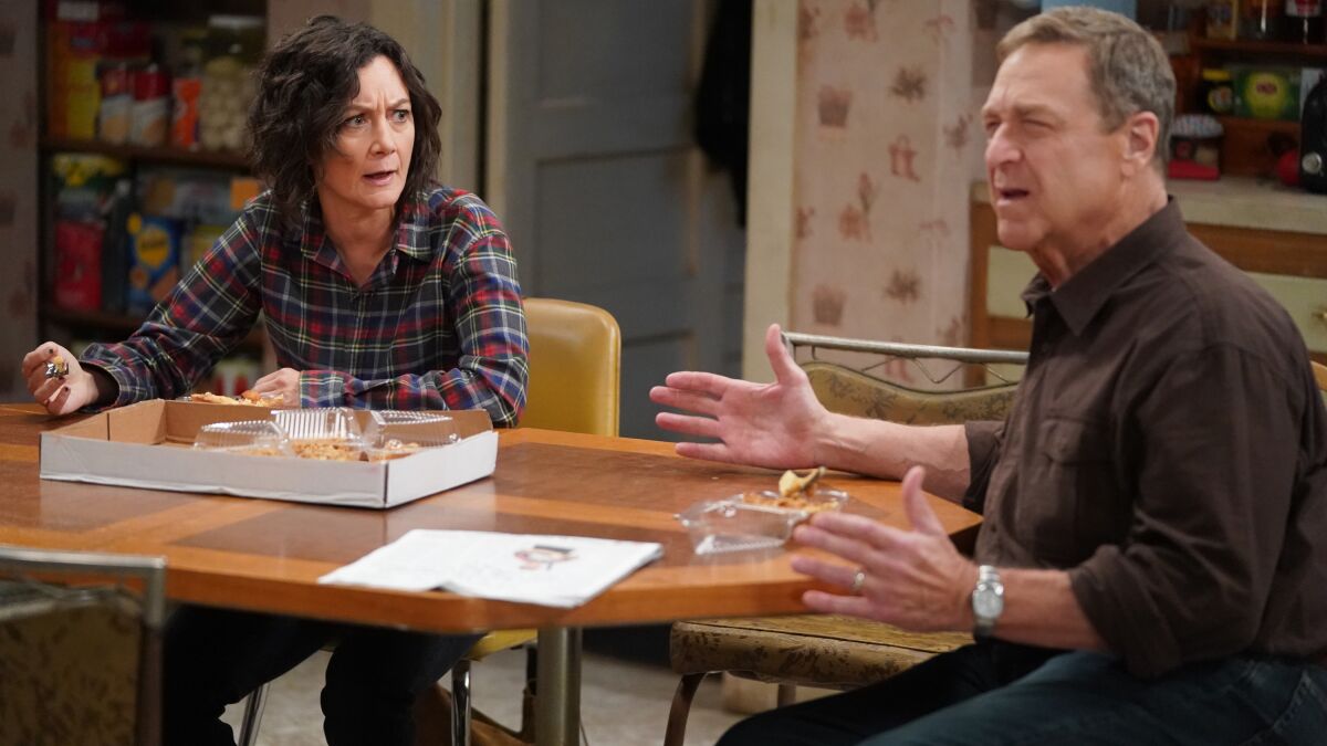 Sara Gilbert and John Goodman in the season premiere of "The Conners" on ABC.