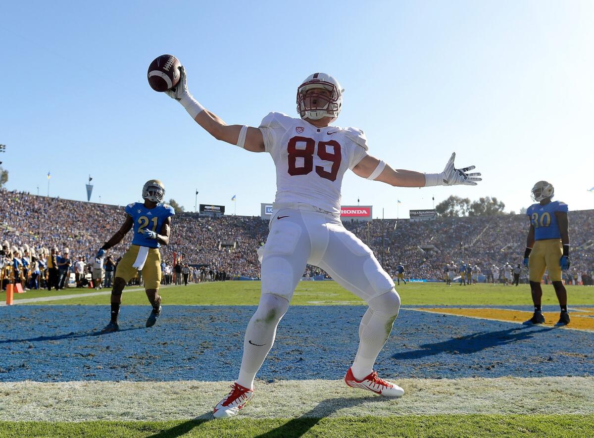 Stanford receiver Devon Cajuste celebrates after scoring on a 37-yard touchdown pass from quarterback Kevin Hogan on Nov. 28, 2014.