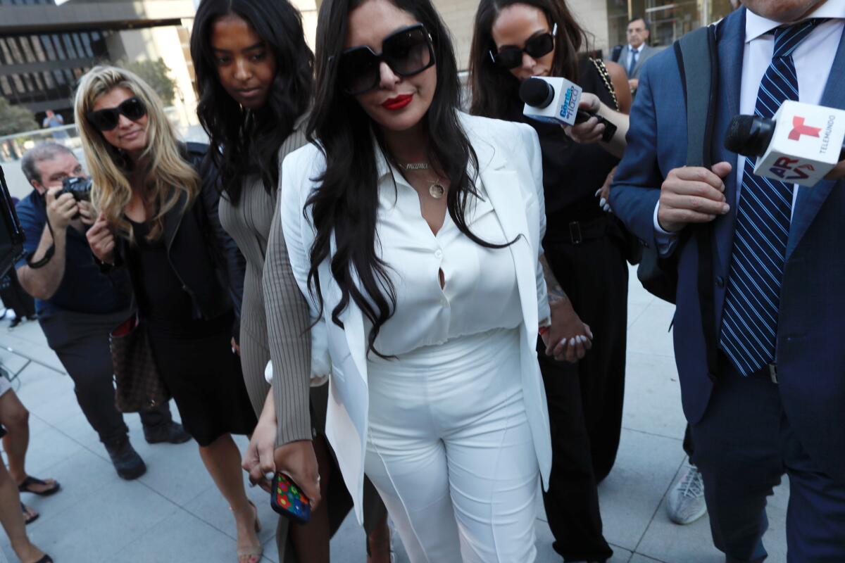 Vanessa Bryant, center, leaving court in Los Angeles