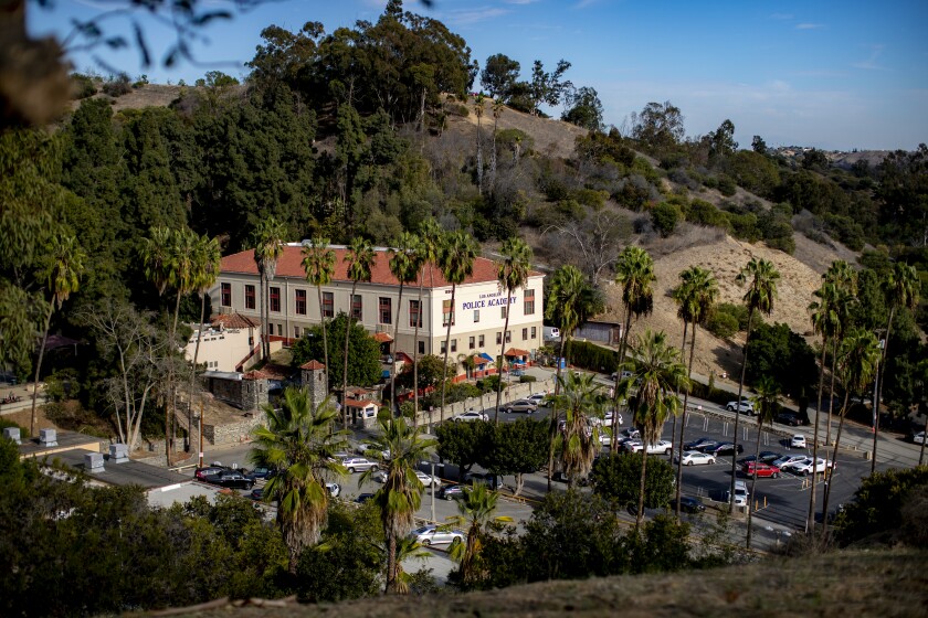 The Los Angeles Police Academy surrounded by palm trees.