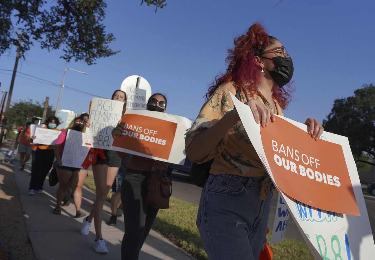 Abortion rights supporters gather to protest Texas SB 8 in front of Edinburg City Hall on Wednesday in Edinburg, Texas. 