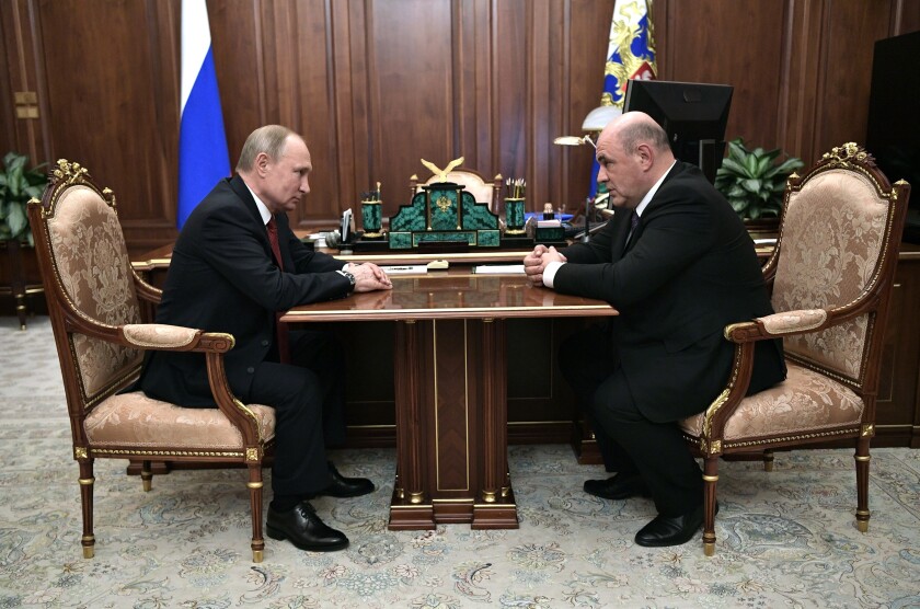 Vladimir Putin and Mikhail Mishustin
