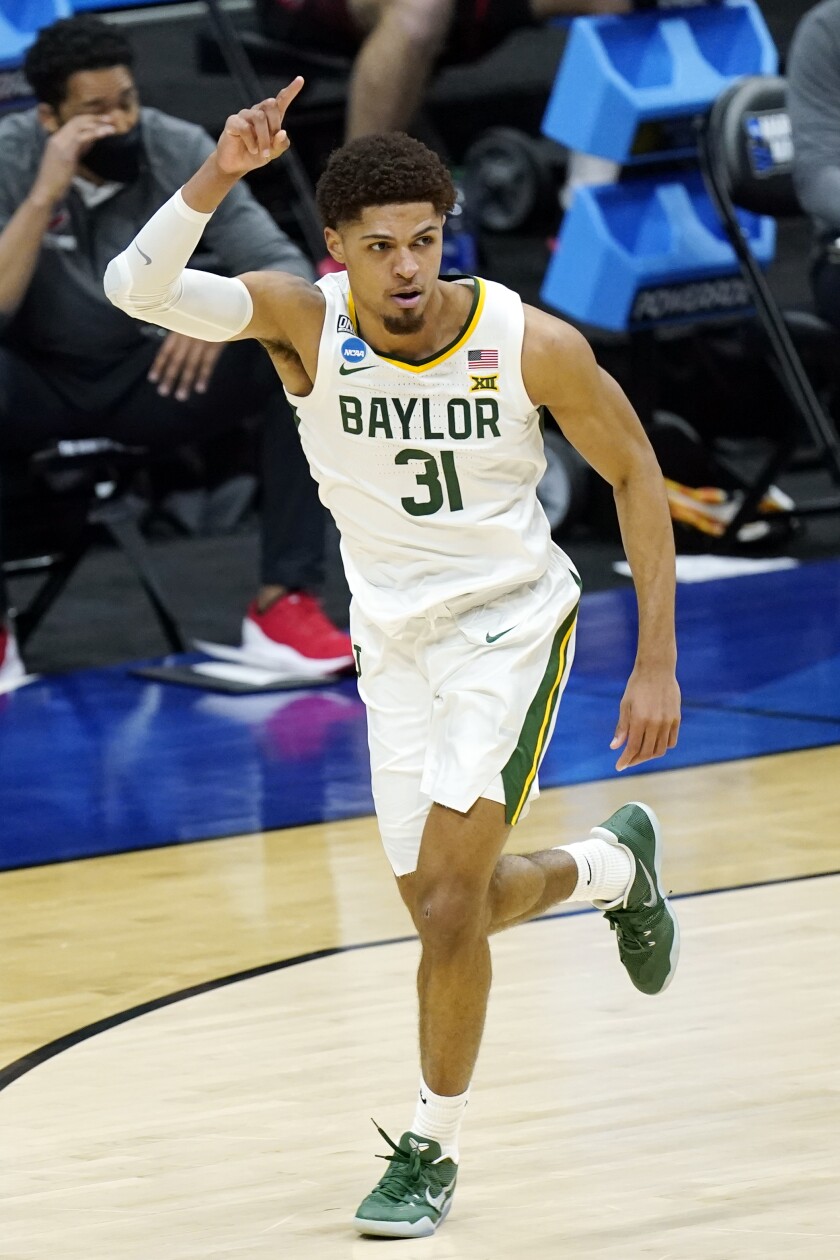 Baylor's MaCio Teague celebrates after scoring against Hartford.