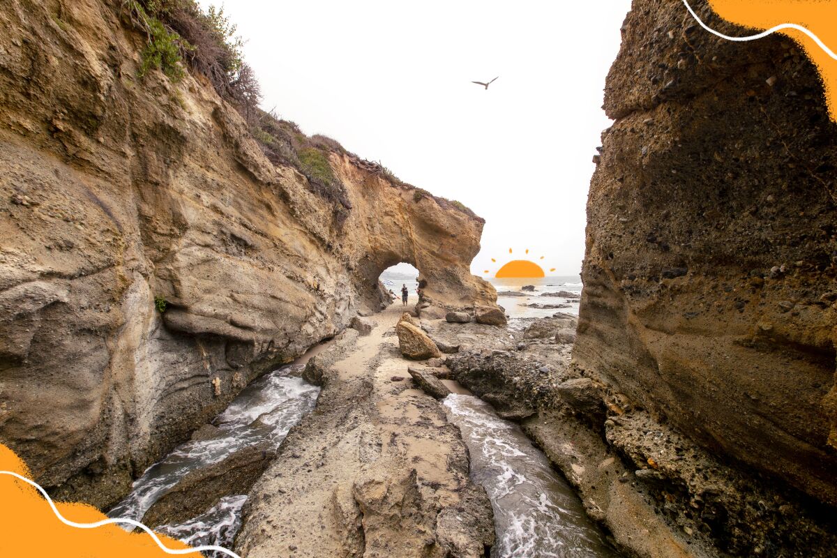Photo illustration shows a keyhole opening in a cliff at a rocky beach.