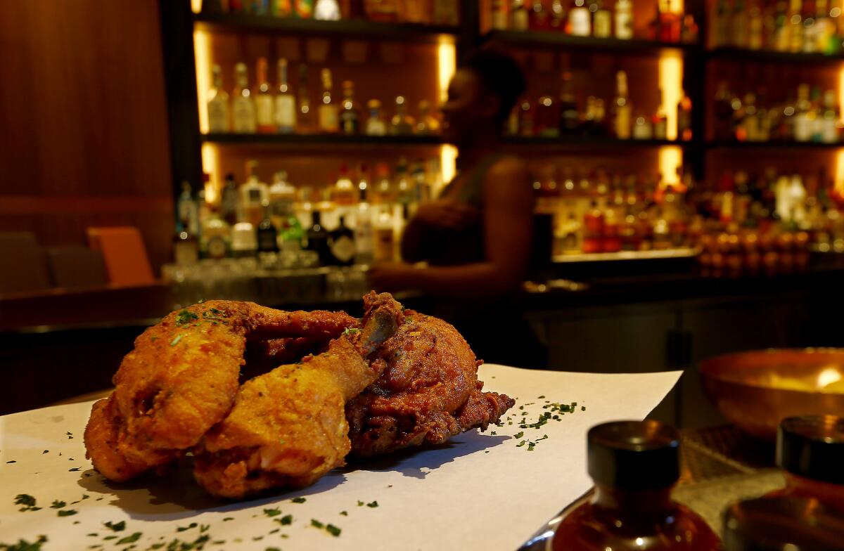 Fried chicken is a popular dish at Shaquille's, which adds Southern flair to the dining choices.