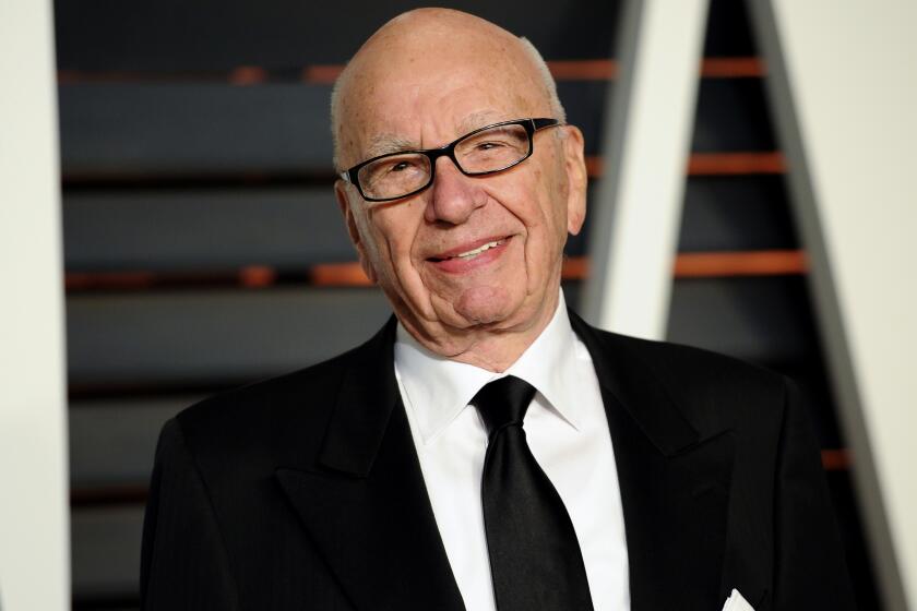 Rupert Murdoch arrives at the 2015 Vanity Fair Oscar Party on Sunday, Feb. 22, 2015, in Beverly Hills, Calif. (Photo by Evan Agostini/Invision/AP)