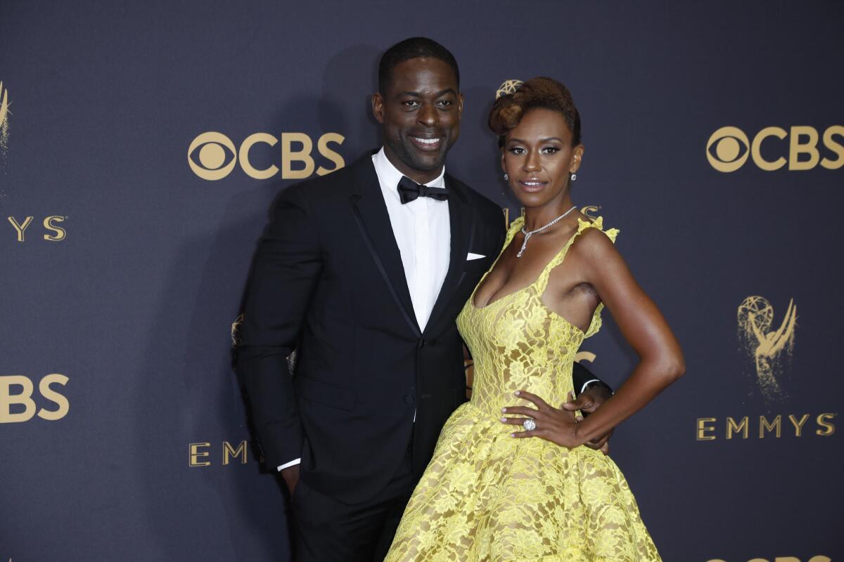 "This Is Us" actor Sterling K. Brown and Ryan Michelle Bathe arrive at the 69th Emmy Awards at the Microsoft Theater in Los Angeles.