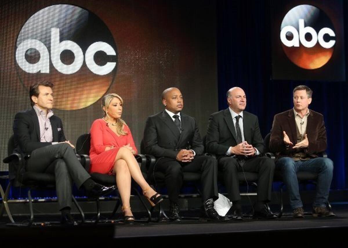 Hosts Robert Herjavec, Lori Greiner, Daymond John, Kevin O'Leary and executive producer Clay Newbill of "Shark Tank" speak onstage during the ABC portion of the 2013 Winter TCA Tour at Langham Hotel in Pasadena.