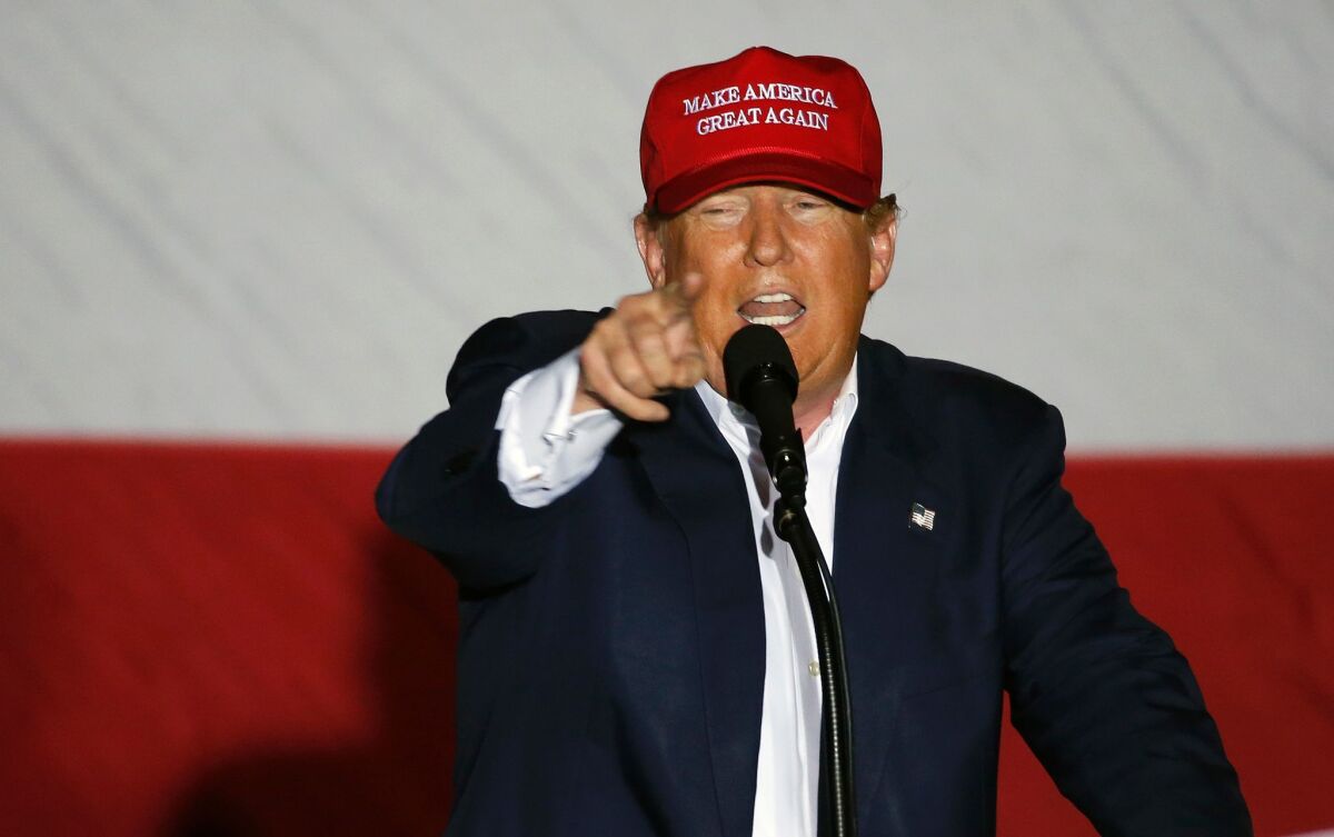Republican presidential candidate Donald Trump speaks at a rally on Sunday in Boca Raton, Fla.