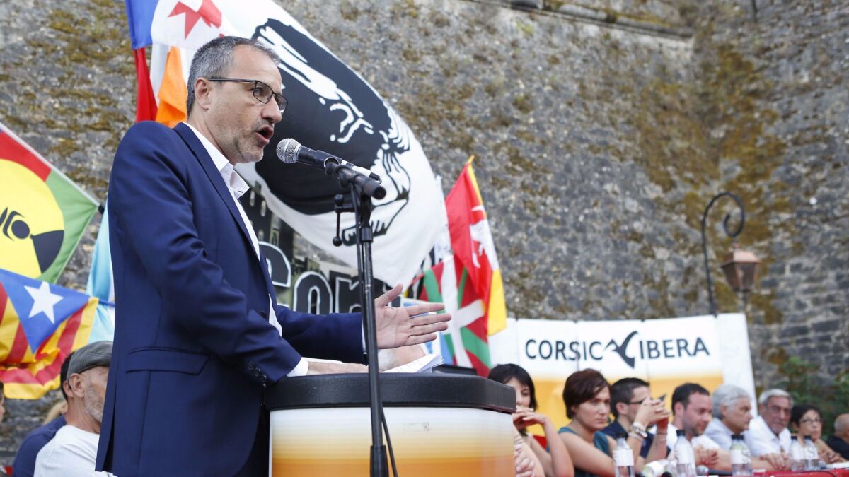 The president of the Corsican Assembly and leader of the left-wing separatist party Corsica Libera, Jean Guy Talamoni, delivers a speech on the Mediterranean island of Corsica in August 2017.