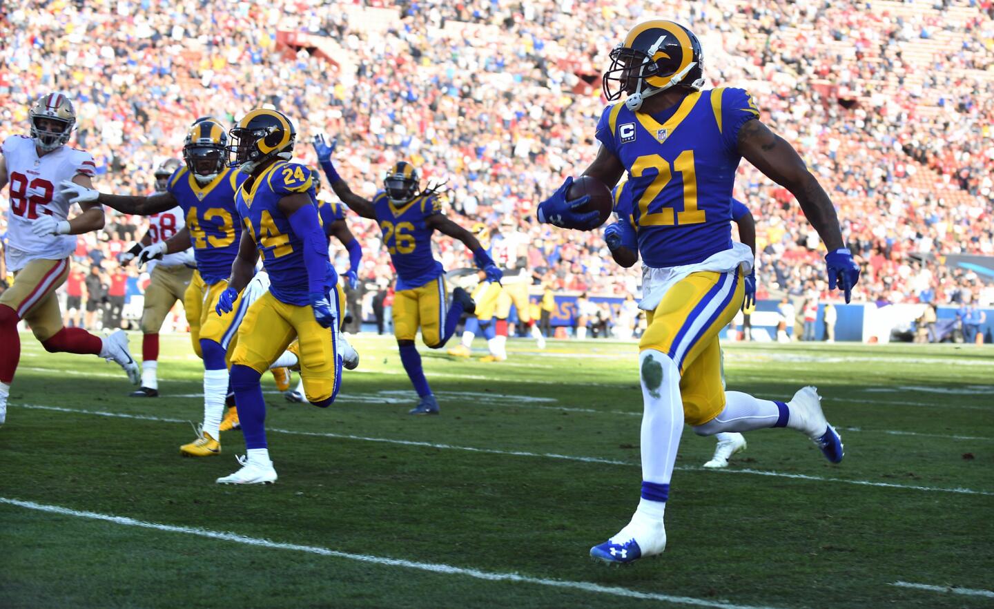 Rams cornerback Aqib Talib returns a fumble against the 49ers.